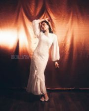 Enchanting Actress Kajal Aggarwal in a White Textured Long sleeve Dress Photos 02