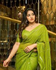 Enchanting Actress Malavika Menon in a Olive Green Silk Saree Photos 06