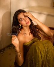 Enchanting Actress Pooja Hegde in a Olive strapless lace gown Photos 03