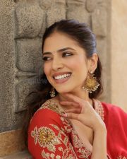 Enchanting Malavika Mohanan in a Vibrant Red Anarkali Suit Photos 02