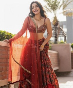 Enchanting Neha Sharma in Red Lehenga Photos 02