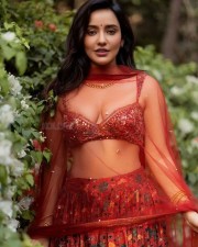 Enchanting Neha Sharma in Red Lehenga Photos 03
