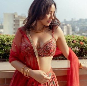 Enchanting Neha Sharma in Red Lehenga Photos 04