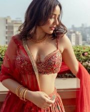 Enchanting Neha Sharma in Red Lehenga Photos 04