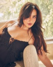 Enchanting Neha Sharma in a Black Lace Trim and Ruffled Mini Dress with a Front Lace Up Tie Detail Photos 04
