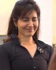 Engaging Actress Raashi Khanna in a Black Zip up Athletic Jacket Photos 01