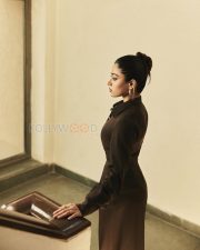 Enigmatic Actress Rashmika Mandanna in a Dark Brown Button Front Maxi Dress Photos 01