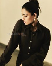 Enigmatic Actress Rashmika Mandanna in a Dark Brown Button Front Maxi Dress Photos 02