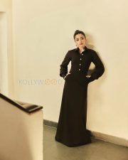 Enigmatic Actress Rashmika Mandanna in a Dark Brown Button Front Maxi Dress Photos 04