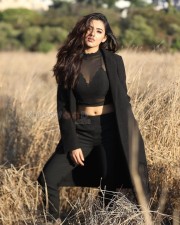 Enticing Beauty Malvika Sharma in a Black Dress Pictures 02