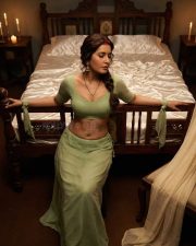 Erotic Raashi Khanna in an Olive Green Short Sleeved Blouse with a High Waisted Skirt Photos 05