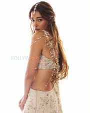 Ethereal Actress Ananya Panday in a White Pearl Embellished Bridal Lehenga Blouse with Maang Tikka Photos 03