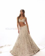Ethereal Actress Ananya Panday in a White Pearl Embellished Bridal Lehenga Blouse with Maang Tikka Photos 06