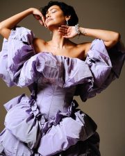 Ethereal Actress Esha Gupta in a Lavender Sculptural Off Shoulder Puff Ruffle Gown Photos 02