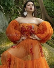 Ethereal Actress Tamannaah Bhatia in an Orange Tulle Off Shoulder Gown Photos 01