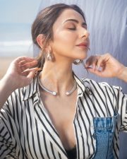 Fashionable Rakul Preet Singh in a Black and White Striped Denim Shirt with a Black Bralette and Fitted Pencil Skirt Pictures 01