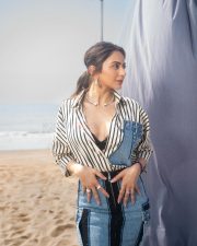 Fashionable Rakul Preet Singh in a Black and White Striped Denim Shirt with a Black Bralette and Fitted Pencil Skirt Pictures 04