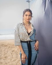 Fashionable Rakul Preet Singh in a Black and White Striped Denim Shirt with a Black Bralette and Fitted Pencil Skirt Pictures 05