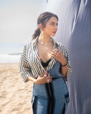 Fashionable Rakul Preet Singh in a Black and White Striped Denim Shirt with a Black Bralette and Fitted Pencil Skirt Pictures 06