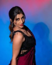 Game Changer Beauty Yashika Aannand in a Red Wine Saree with a Black Sleeveless Blouse Pictures 06