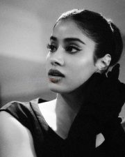 Glam Janhvi Kapoor in a Black Vintage Corset Style Body Hugging Sleeveless Dress Pictures 01