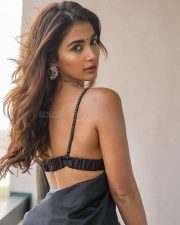 Glam Pooja Hegde in a Black Saree with Sleeveless Blouse Pictures 01 Glam Pooja Hegde in a Black Saree with Sleeveless Blouse Pictures 01