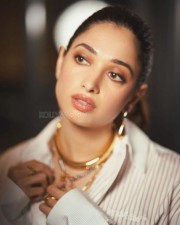 Glam Tamannaah Bhatia in a Casual Off White Cropped Shirt with Black Bra and Blue Denim Jeans Pictures 03