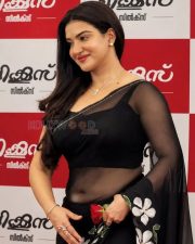 Glamorous Actress Honey Rose in a Black Chiffon Saree With White Floral Applique Photos 06