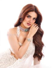 Glamorous Actress Nidhhi Agerwal in a White Embroidered Lehenga Photos 01