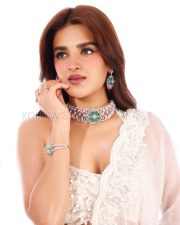 Glamorous Actress Nidhhi Agerwal in a White Embroidered Lehenga Photos 02