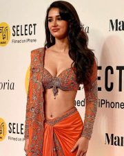 Glamorous Disha Patani in a Vibrant Orange Saree with a Plunging Neckline Blouse at MAMI Film Festival Photos 02