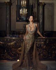 Glamorous Esha Gupta Cleavage in a Gold Crystal Embellished Halter Gown Photos 02