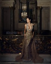 Glamorous Esha Gupta Cleavage in a Gold Crystal Embellished Halter Gown Photos 09