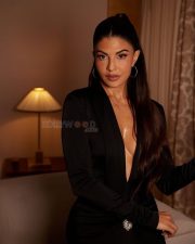 Glamorous Jacqueline Fernandez in a Deep Neck Black Gown at Paris Fashion Week Pictures 01