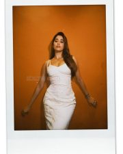 Glamorous Janhvi Kapoor in a White Fish Cut Skin Tight Embroidered Dress Pictures 04