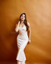 Glamorous Janhvi Kapoor in a White Fish Cut Skin Tight Embroidered Dress Pictures 05