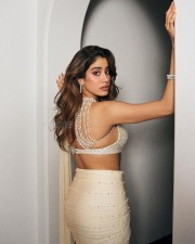Glamorous Janhvi Kapoor in a White Pearl Saree with a Bralette Top with Plunging Neckline Photos 03