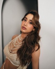 Glamorous Janhvi Kapoor in a White Pearl Saree with a Bralette Top with Plunging Neckline Photos 05