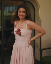 Glamorous Keerthy Suresh in a Light Pink Strappy Gown with a Red Rose Photos 03