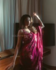 Glamorous Keerthy Suresh in a Red Saree with Sleeveless Blouse Photos 02