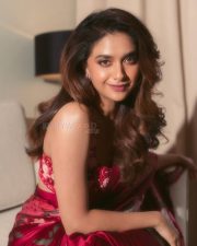 Glamorous Keerthy Suresh in a Red Saree with Sleeveless Blouse Photos 03