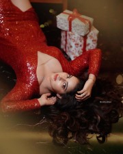 Glamorous Malavika Menon in a Christmas Red Dress Photos 02