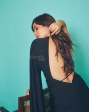 Glamorous Neha Sharma in a Sleek Black Backless Dress Photos 04