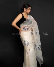 Glamorous Priyamani in a White Transparent Saree with Black Sleeveless Blouse Pictures 03