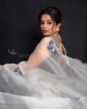 Glamorous Priyamani in a White Transparent Saree with Black Sleeveless Blouse Pictures 06