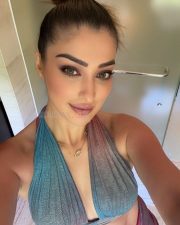 Glamorous Raai Laxmi Cleavage in a Multicolor Halter Top Photos 01