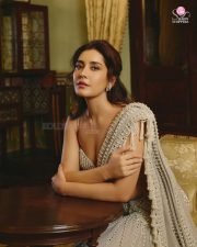 Glamorous Raashi Khanna in a Powder Grey Chandelier Pearl Drop Saree with a Sleeveless Bralette Blouse Pictures 07