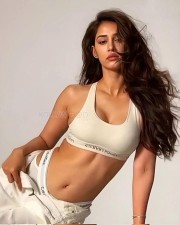 Glittering Disha Patani in a White Calvin Klein Outfit Pictures 03