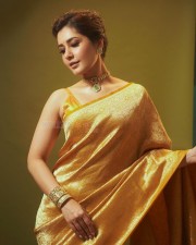 Golden Beauty Raashi Khanna in a Yellow Silk Saree with Sleeveless Blouse Pictures 03