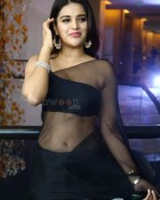Gorgeous Beauty Nidhhi Agerwal in Transparent Black Saree Photos 17